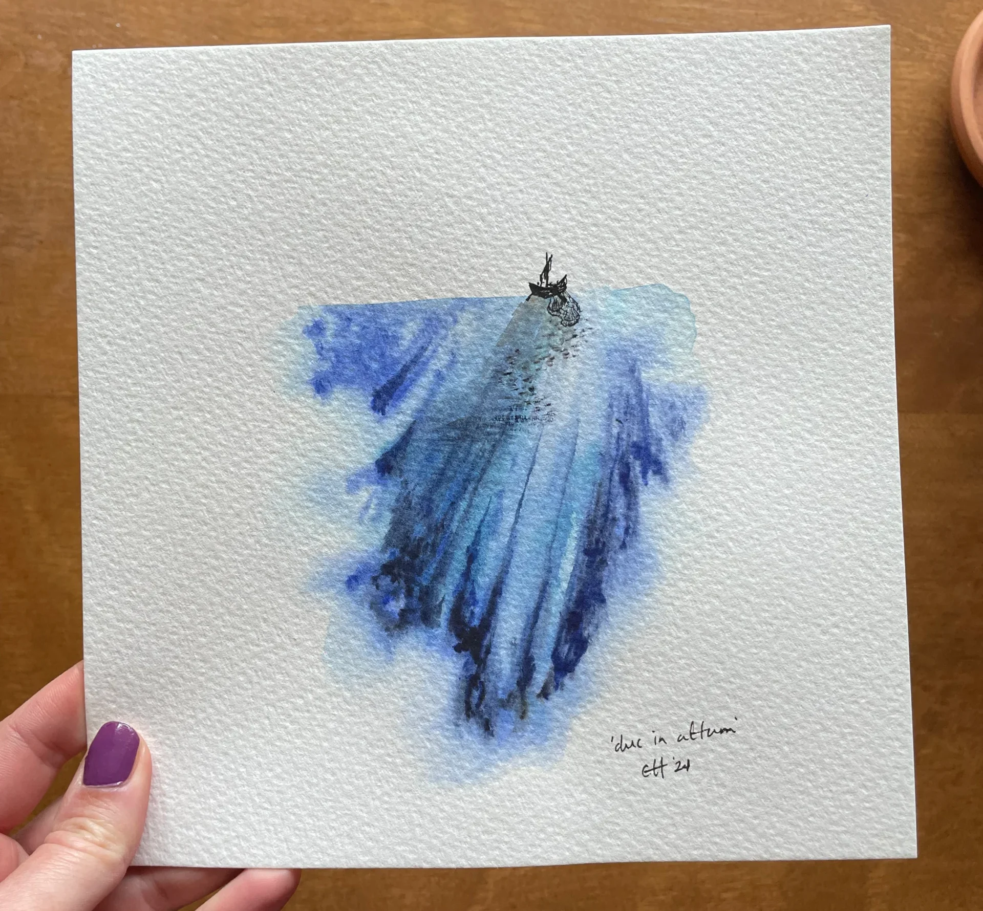 watercolor painting of a small ship at the edge of a blue abyss, lowering its net toward a scattered school of fish